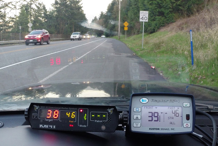 Policeman Using Radar Gun To Detect Speeding Car #2 Metal Print by